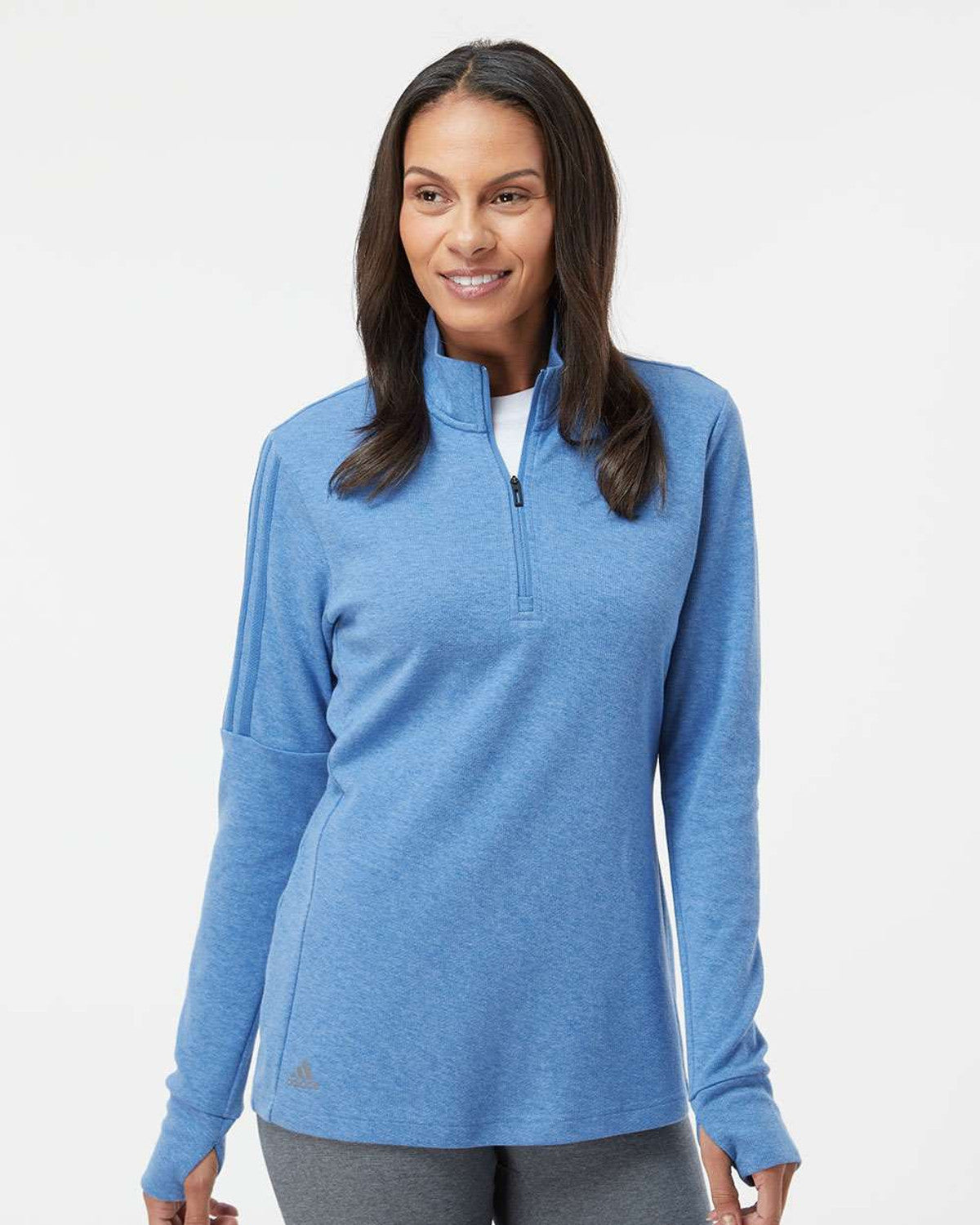 Woman wearing a blue pullover for custom embroidery with a white background
